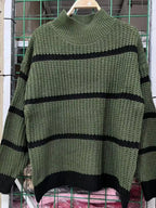 Elegant plus size sweater featuring a stylish striped pattern, perfect for sophisticated and comfortable fashion.