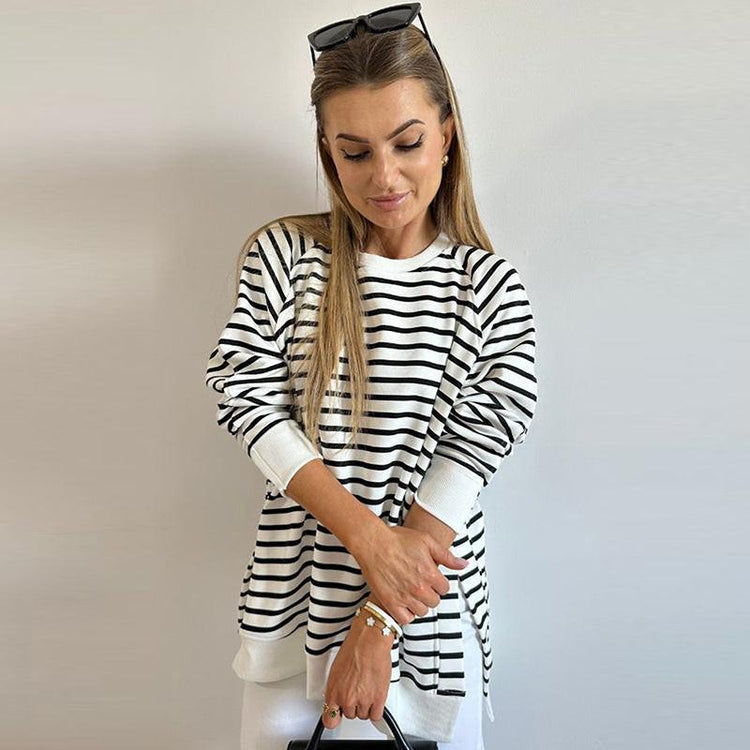 Elegant living room showcasing a cozy ambiance with tasteful decor and refined furnishings