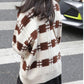 Pullover featuring a classic plaid pattern, perfect for stylish and comfortable casual wear in all seasons