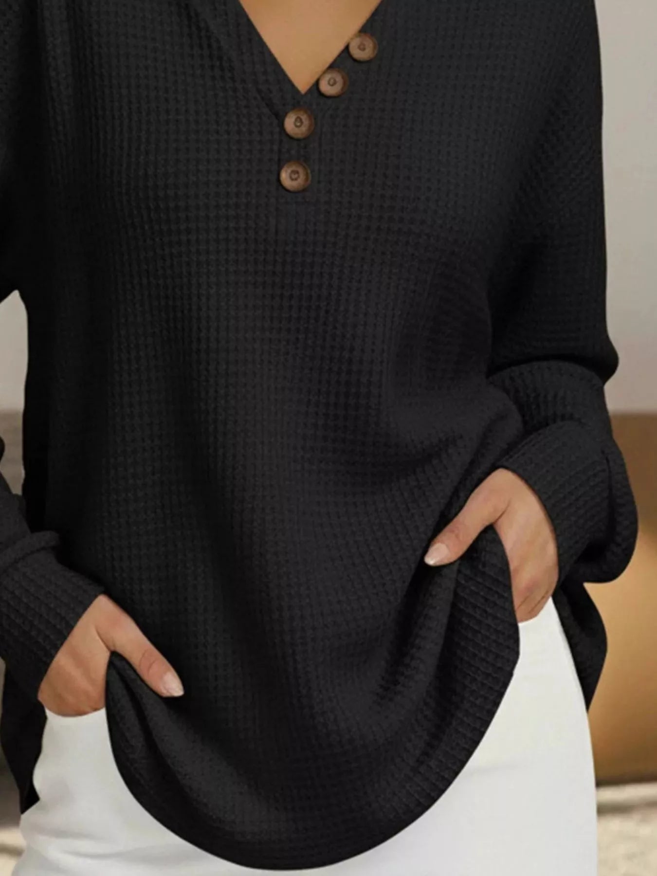 Plus size waffle knit sweater offering comfort and style for all body types, perfect for casual wear.