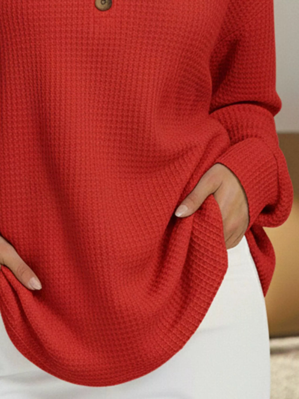 Plus size waffle knit sweater offering comfort and style for all body types, perfect for casual wear.