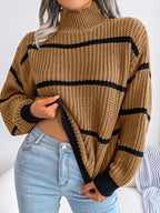Elegant plus size sweater featuring a stylish striped pattern, perfect for sophisticated and comfortable fashion.