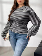 Plus size striped t-shirt featuring a classic design, comfortable fit, and stylish appearance for casual wear