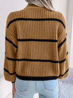 Elegant plus size sweater featuring a stylish striped pattern, perfect for sophisticated and comfortable fashion.