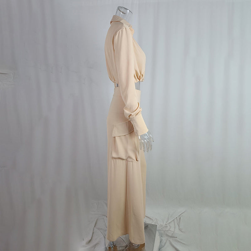 Womens plus size pant set in soft beige, featuring a crisscross top and flowy wide-leg pants with side pockets.