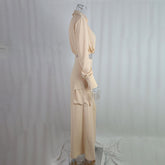 Womens plus size pant set in soft beige, featuring a crisscross top and flowy wide-leg pants with side pockets.