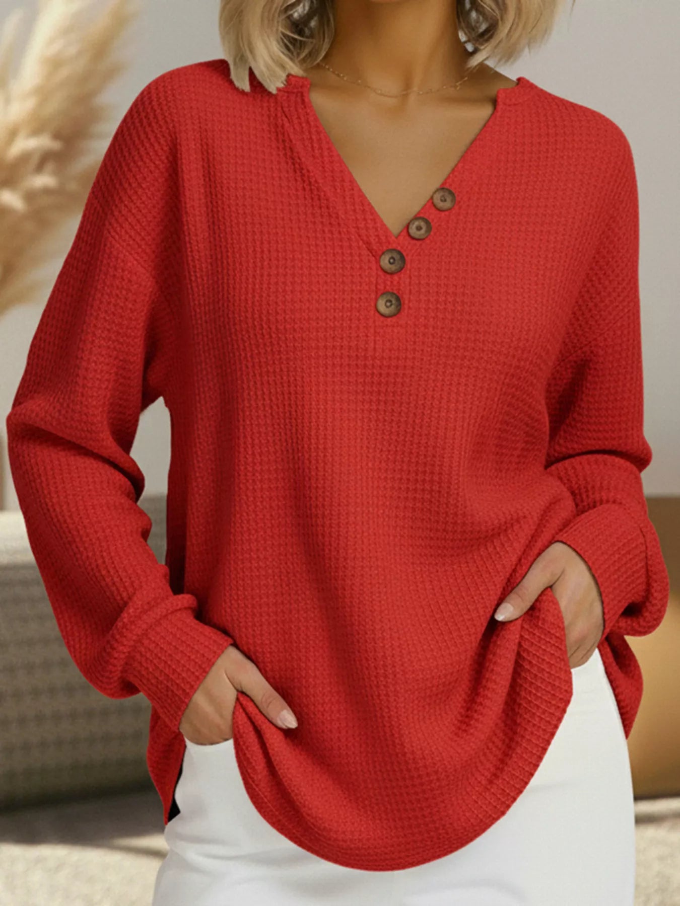 Plus size waffle knit sweater offering comfort and style for all body types, perfect for casual wear.