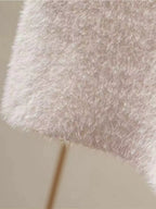 Elegant comfort plush mini skirt for stylish and cozy wear, perfect for versatile fashion.