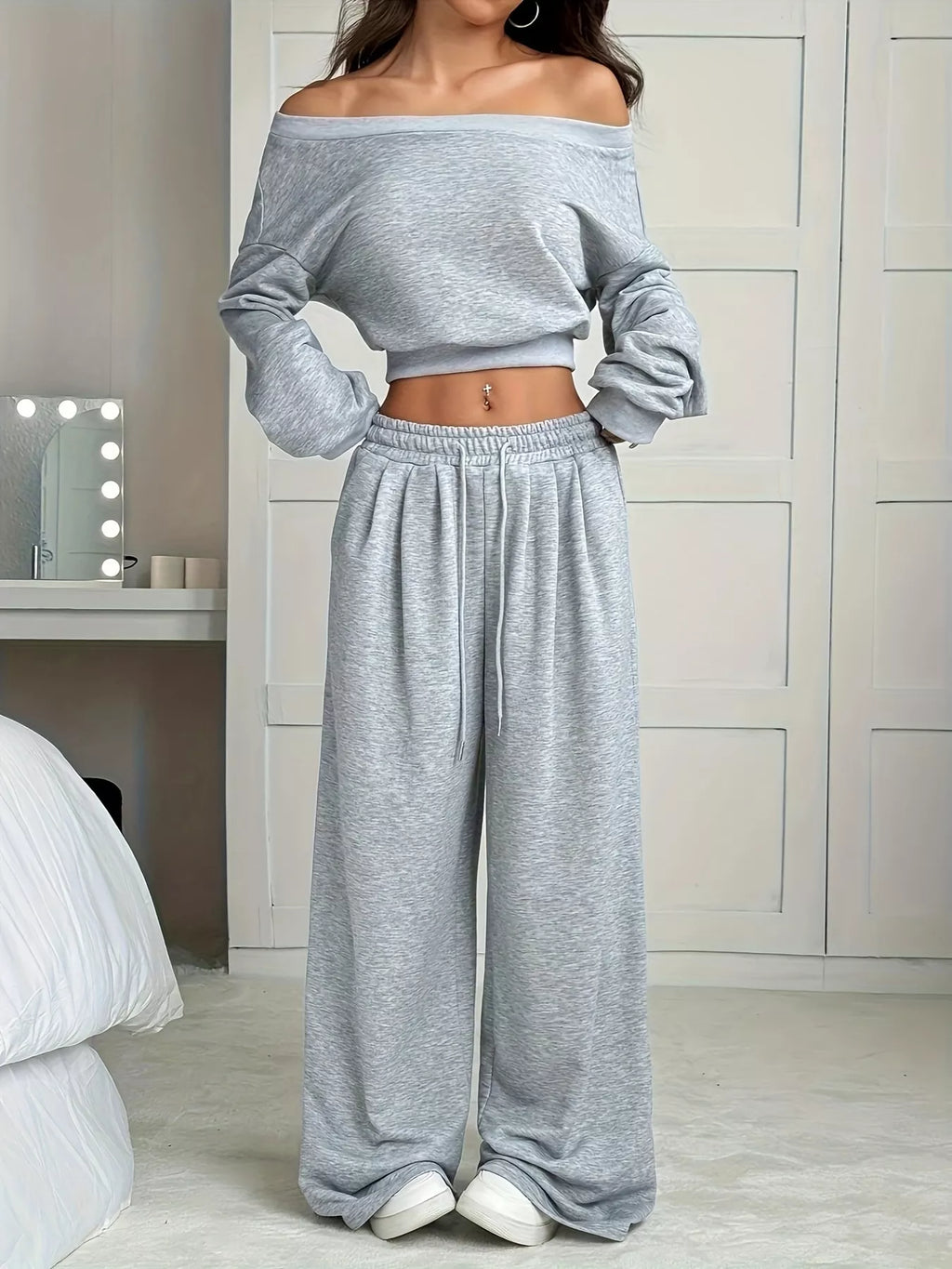 Elegant plus size crop tops paired with wide leg pants for a stylish and comfortable fashion statement.