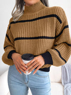 Elegant plus size sweater featuring a stylish striped pattern, perfect for sophisticated and comfortable fashion.