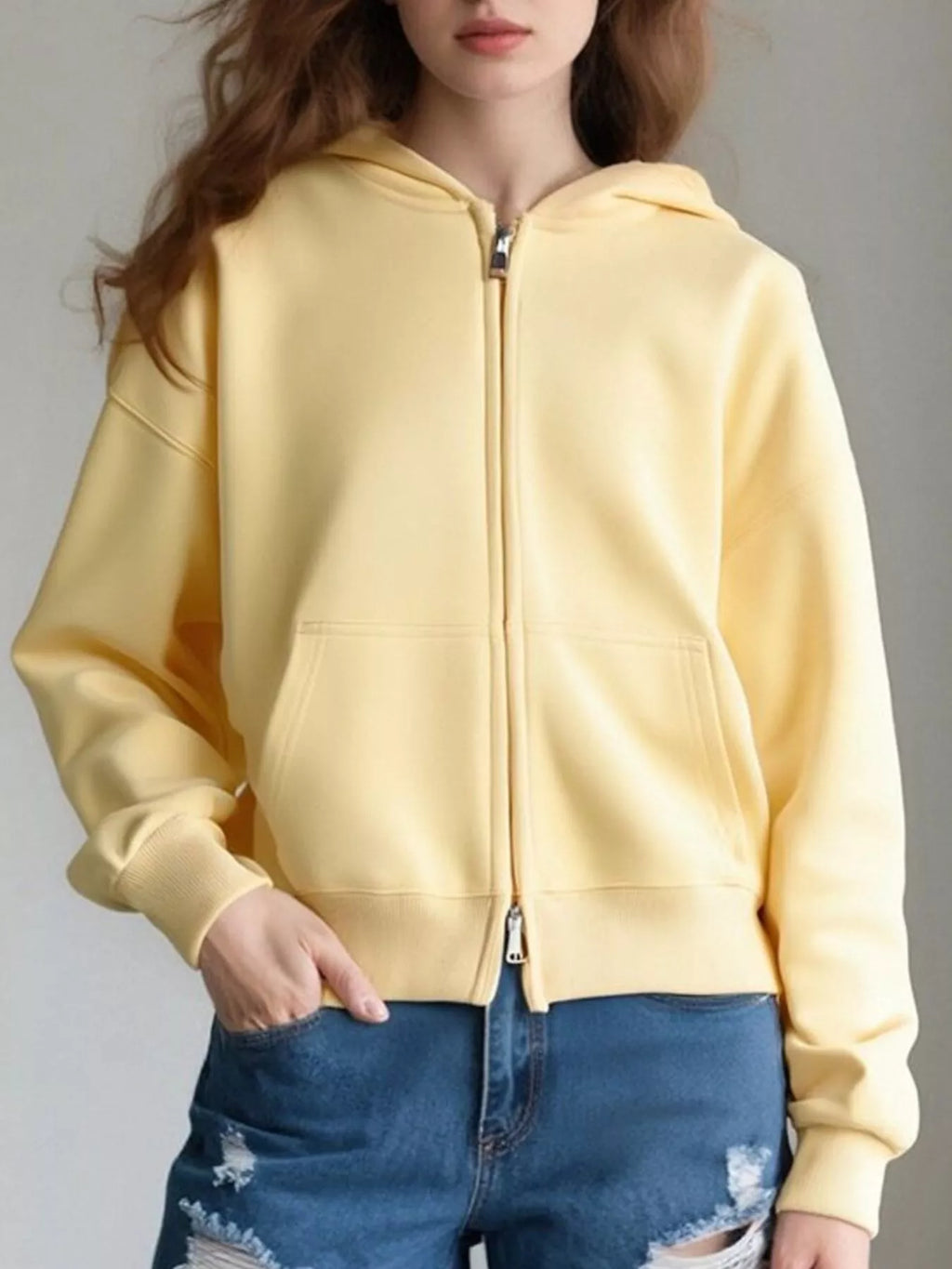 Plus size zip-up hoodie designed for comfort and style, perfect for casual wear and layering