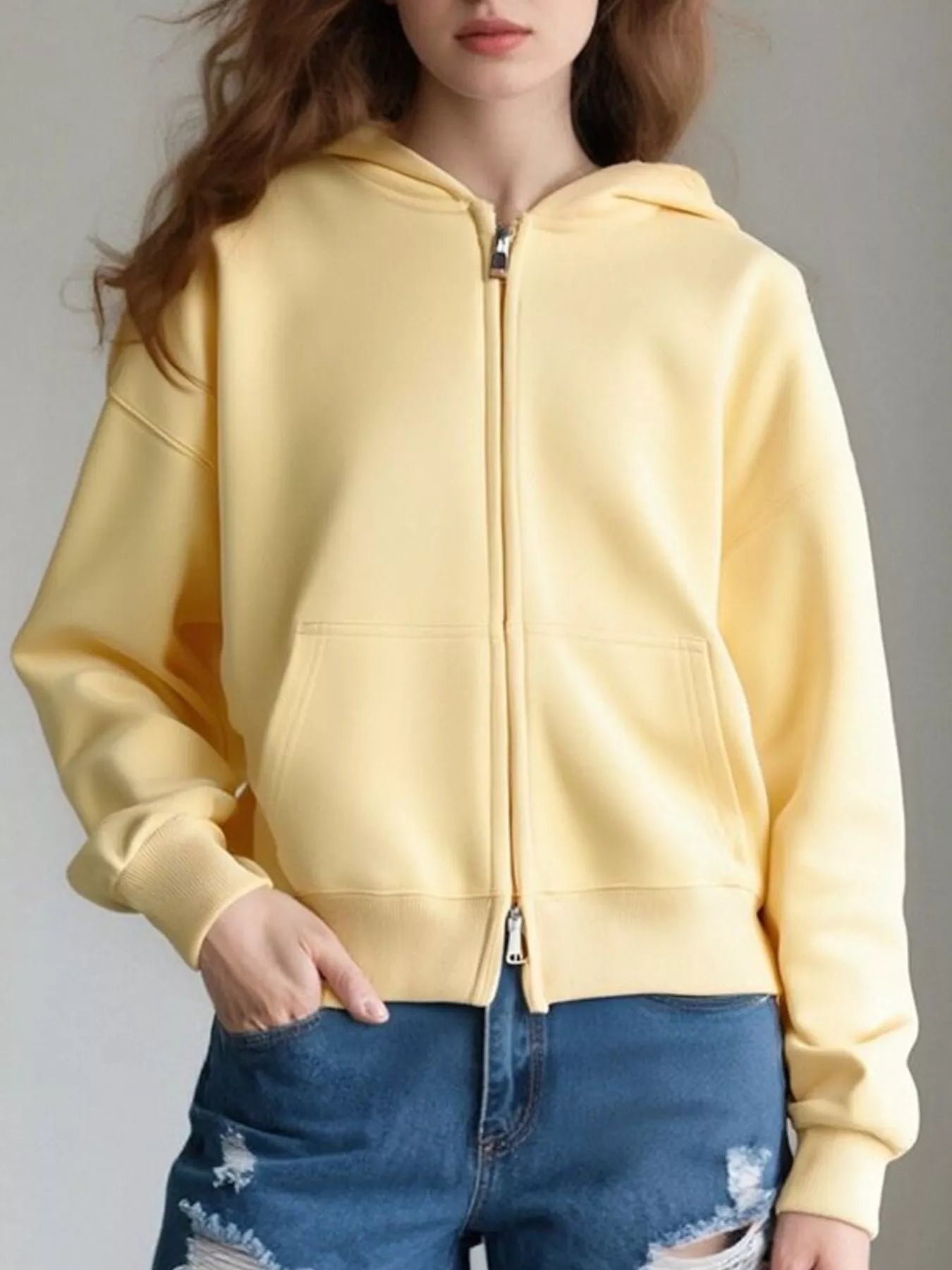 Plus size zip-up hoodie designed for comfort and style, perfect for casual wear and layering