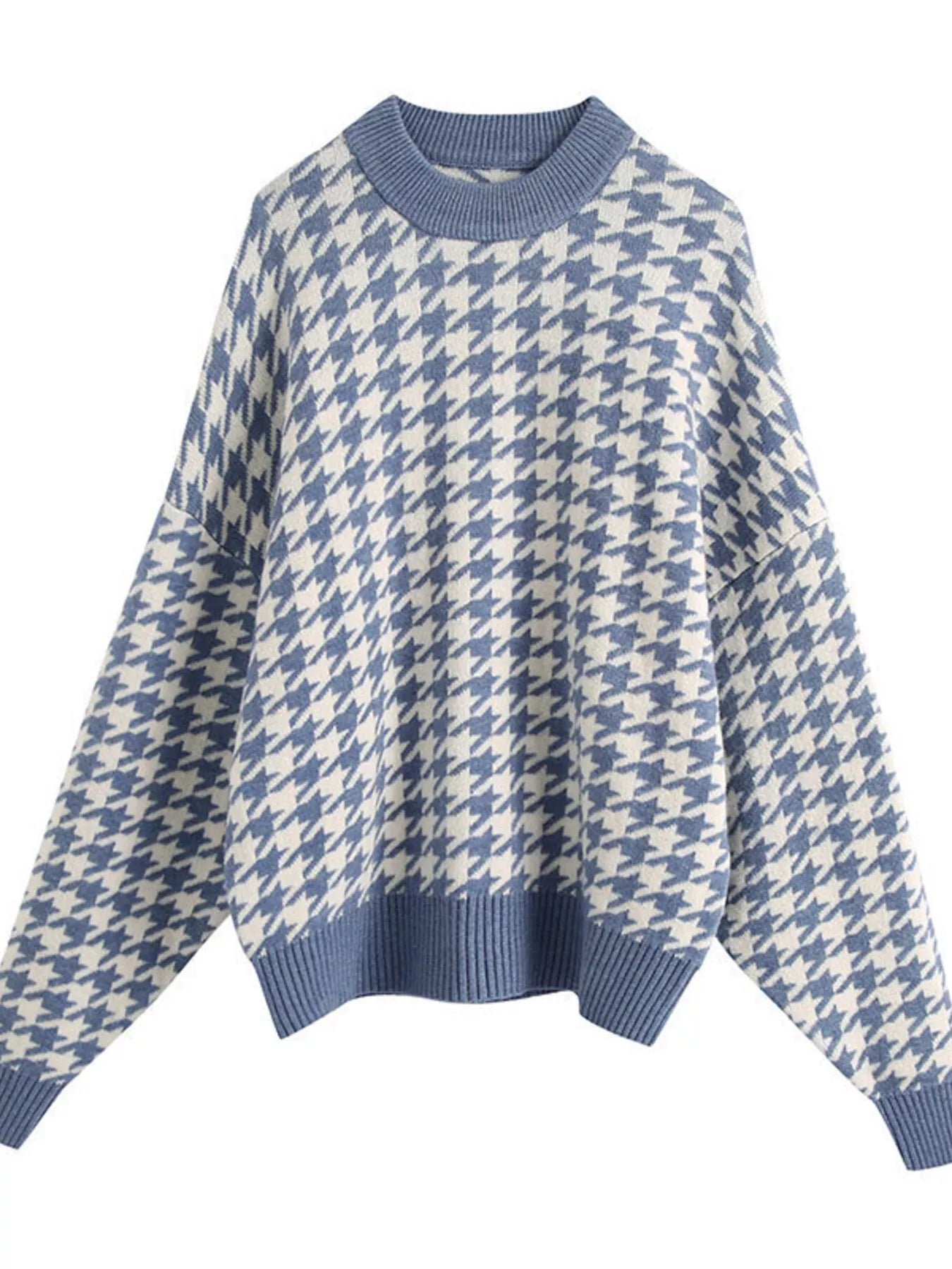 Plus size oversized sweater featuring a classic houndstooth pattern, perfect for stylish comfort.