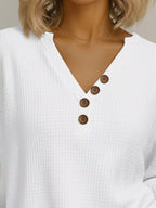 Plus size waffle knit sweater offering comfort and style for all body types, perfect for casual wear.