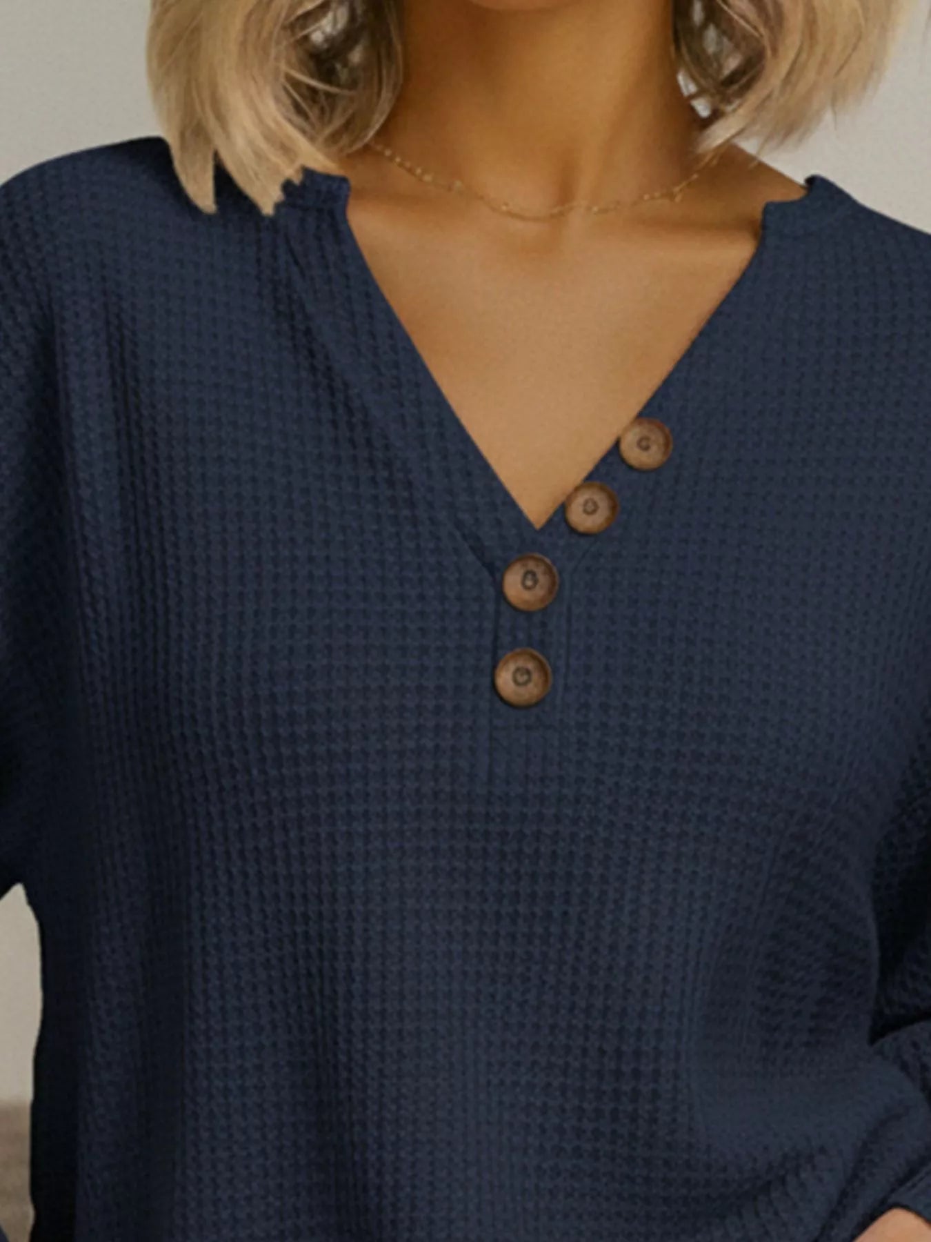 Plus size waffle knit sweater offering comfort and style for all body types, perfect for casual wear.