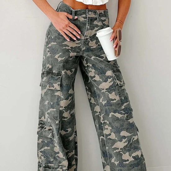 Stylish green camo denim cargo pants showcasing rugged durability and contemporary urban fashion.