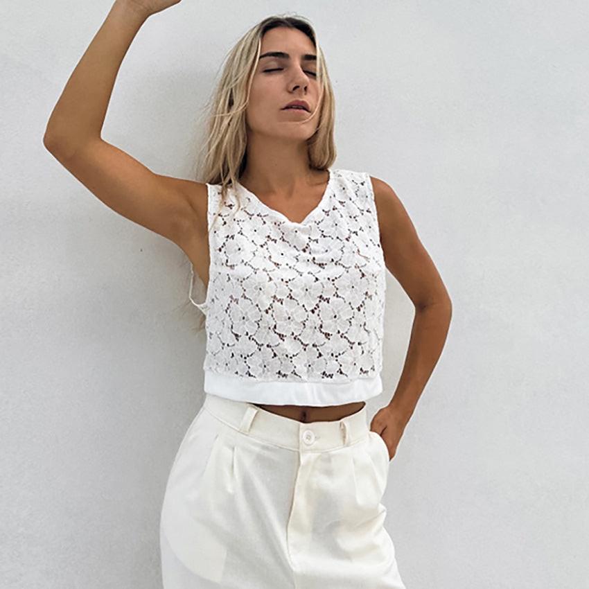 Elegant lace fabric showcasing intricate floral patterns ideal for sophisticated fashion and decor designs.