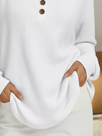 Plus size waffle knit sweater offering comfort and style for all body types, perfect for casual wear.