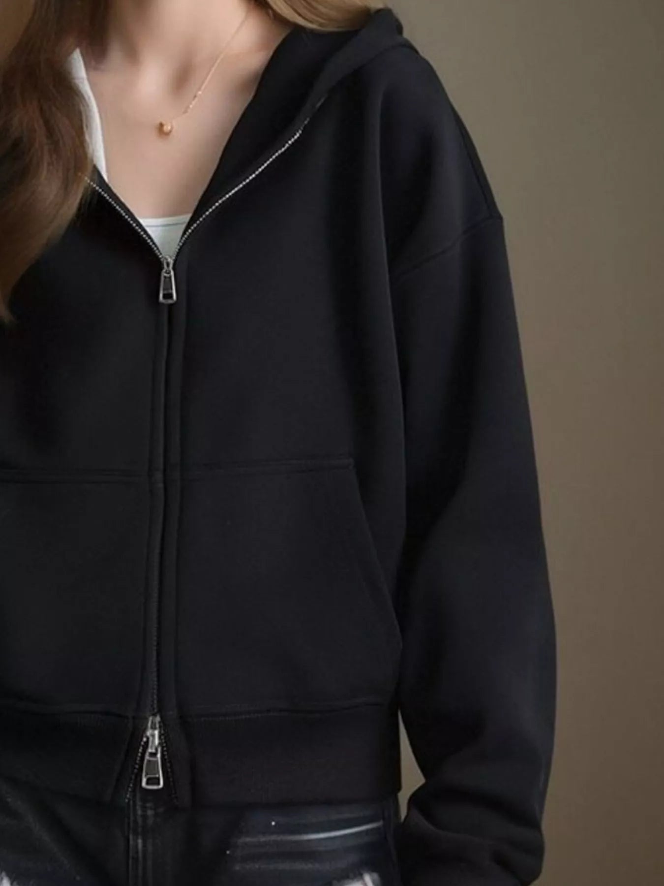 Plus size zip-up hoodie designed for comfort and style, perfect for casual wear and layering