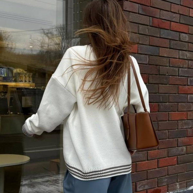 Cozy sweater perfect for chilly days, providing warmth and comfort with stylish design.