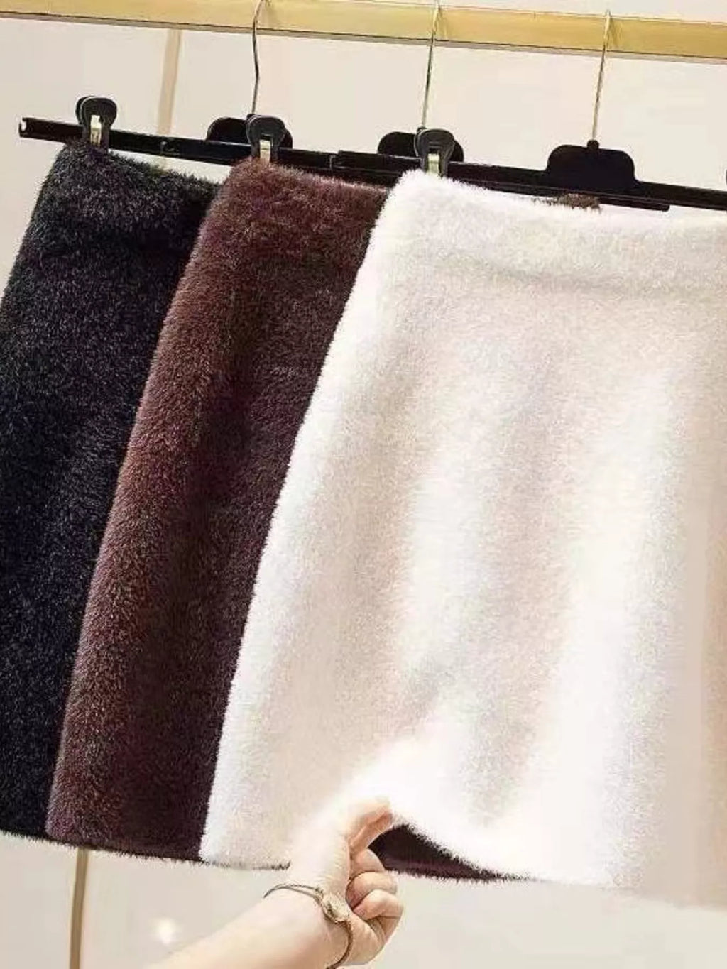 Elegant comfort plush mini skirt for stylish and cozy wear, perfect for versatile fashion.