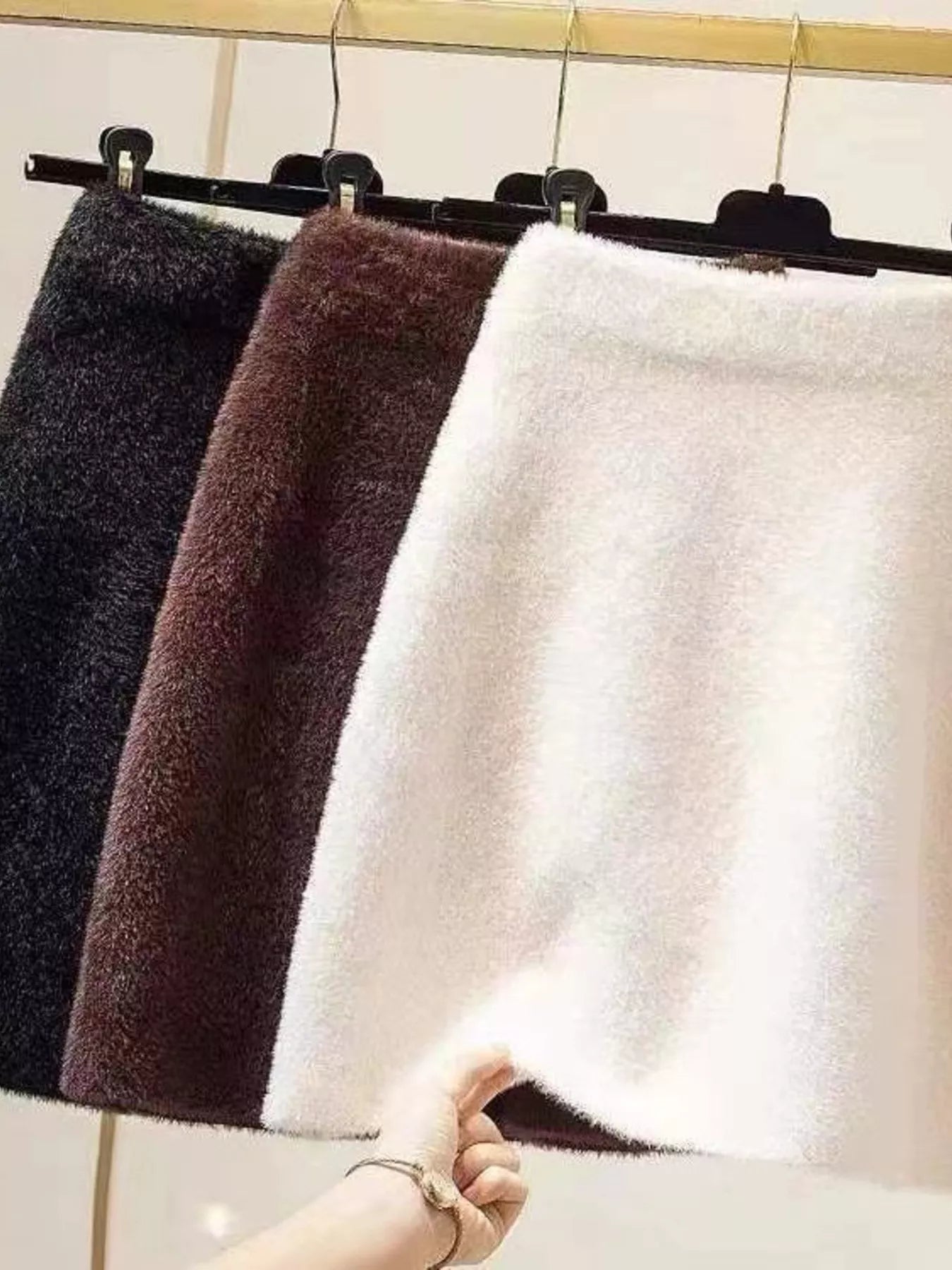 Elegant comfort plush mini skirt for stylish and cozy wear, perfect for versatile fashion.