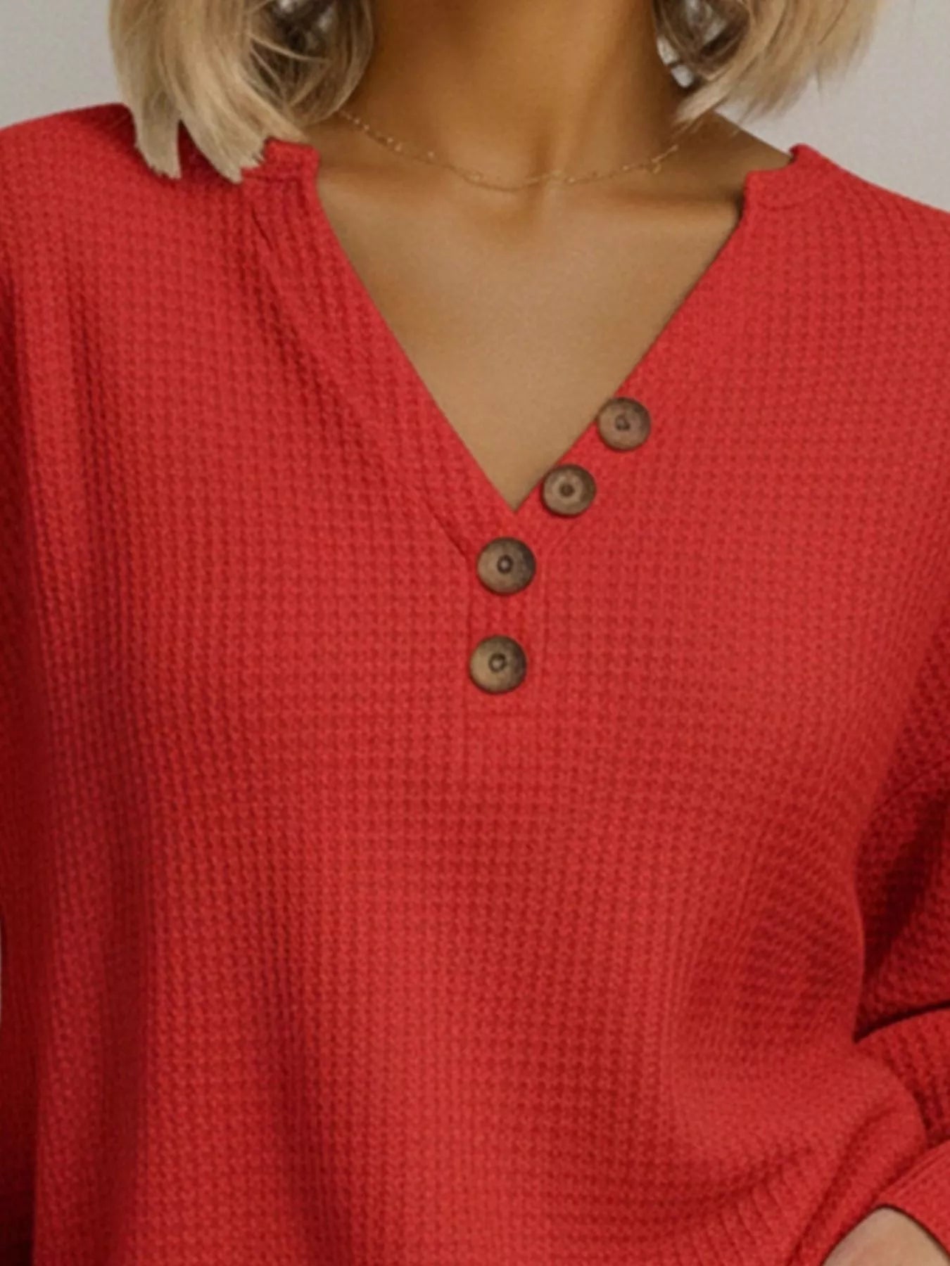 Plus size waffle knit sweater offering comfort and style for all body types, perfect for casual wear.