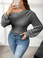 Plus size striped t-shirt featuring a classic design, comfortable fit, and stylish appearance for casual wear