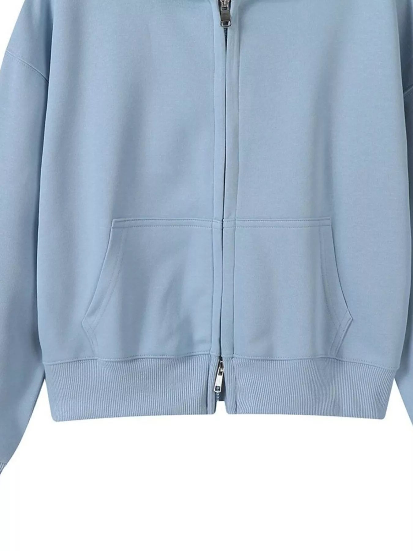 Plus size zip-up hoodie designed for comfort and style, perfect for casual wear and layering
