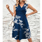 Navy blue floral midi dress with a mid waist design, perfect for summer elegance. Available in various sizes.
