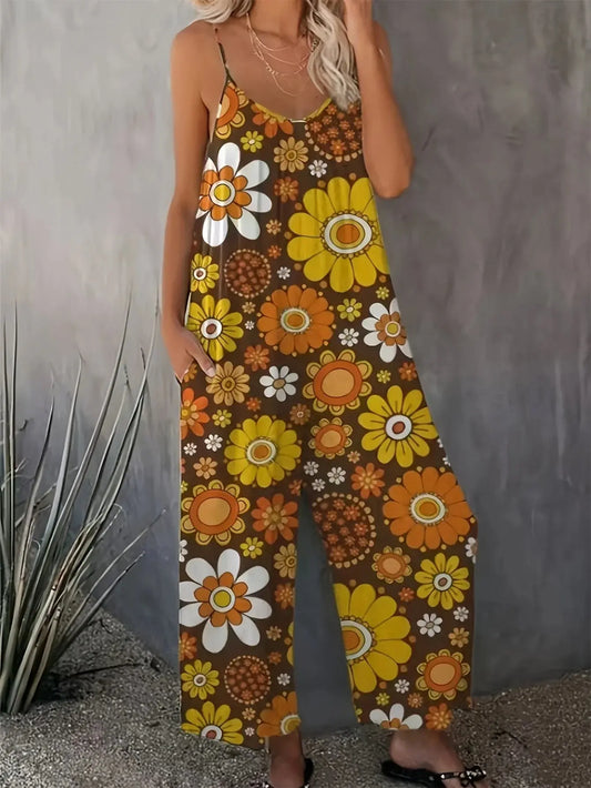 Woman wearing a loose floral print jumpsuit with thin straps