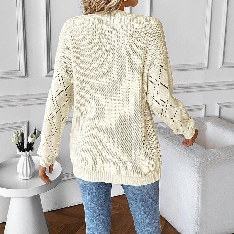 Elegant pullover sweater showcasing refined style and comfortable fit for sophisticated wardrobe choices
