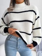 Elegant plus size sweater featuring a stylish striped pattern, perfect for sophisticated and comfortable fashion.