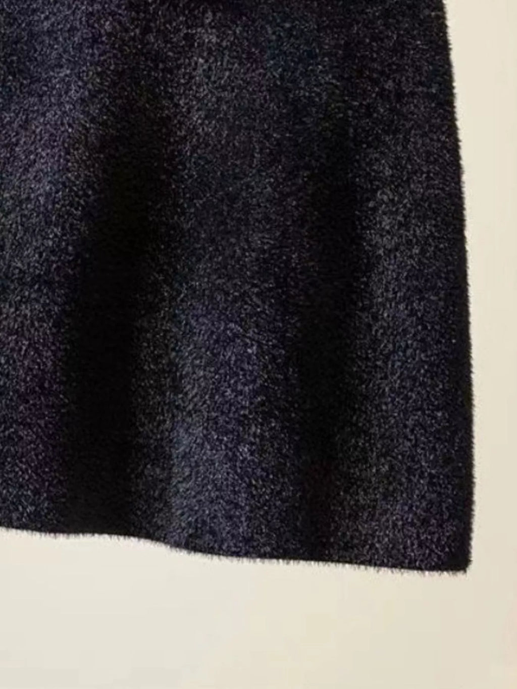 Elegant comfort plush mini skirt for stylish and cozy wear, perfect for versatile fashion.