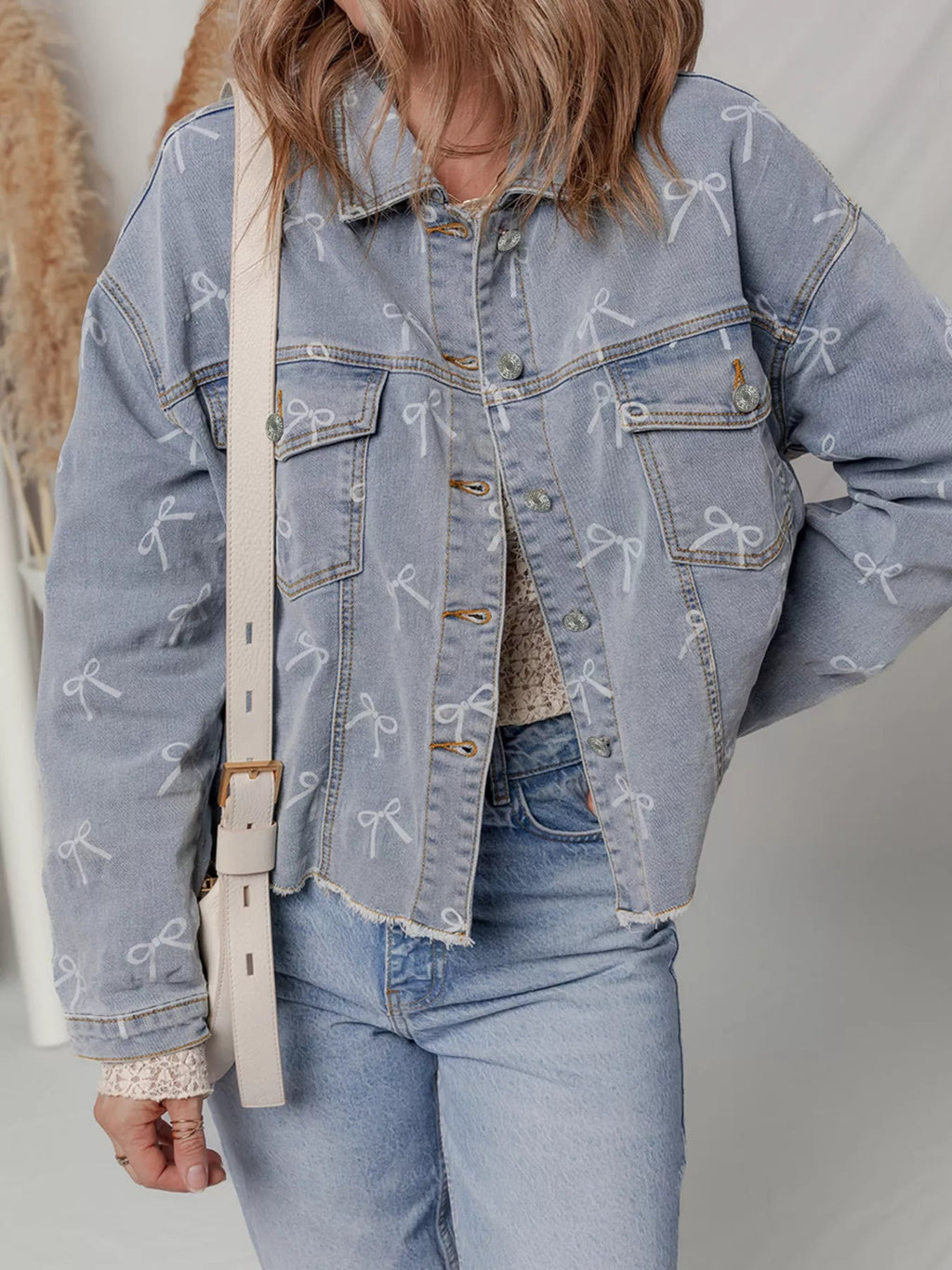 Bow Knot Print Light Wash Raw Hem Denim Jacket.