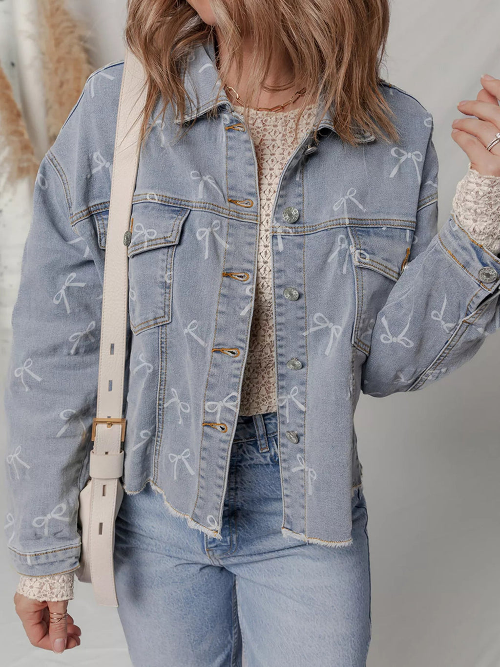 Bow Knot Print Light Wash Raw Hem Denim Jacket.