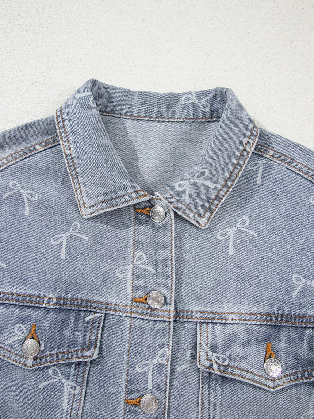 Bow Knot Print Light Wash Raw Hem Denim Jacket.