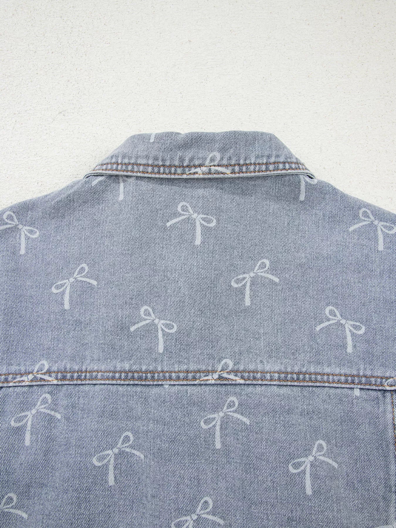 Bow Knot Print Light Wash Raw Hem Denim Jacket.