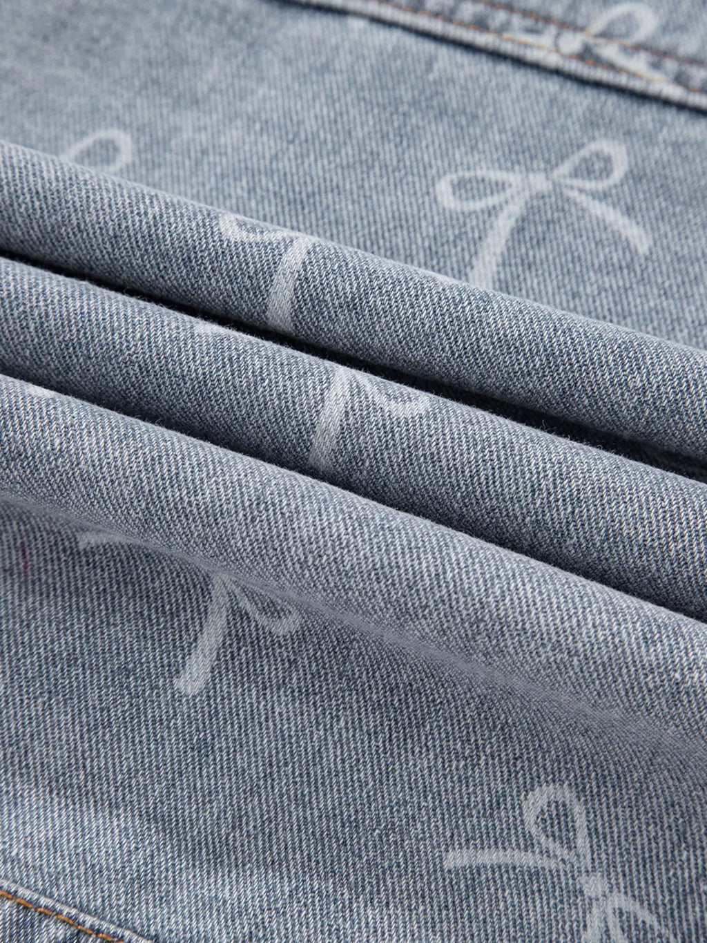 Bow Knot Print Light Wash Raw Hem Denim Jacket.