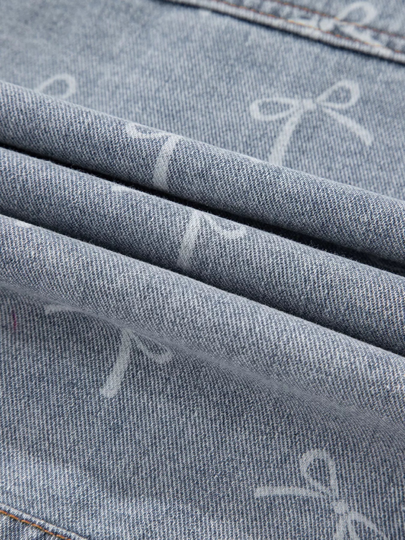 Bow Knot Print Light Wash Raw Hem Denim Jacket.