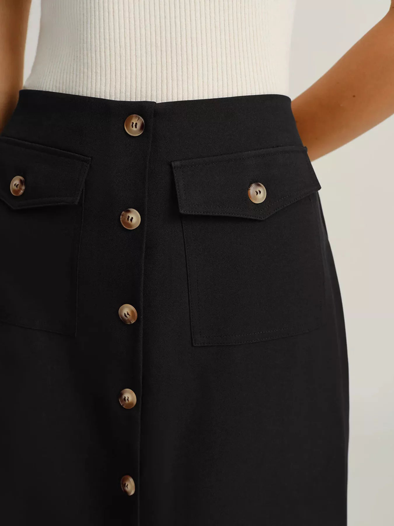 Elegant button-front midi skirt perfect for formal occasions and stylish office wear.