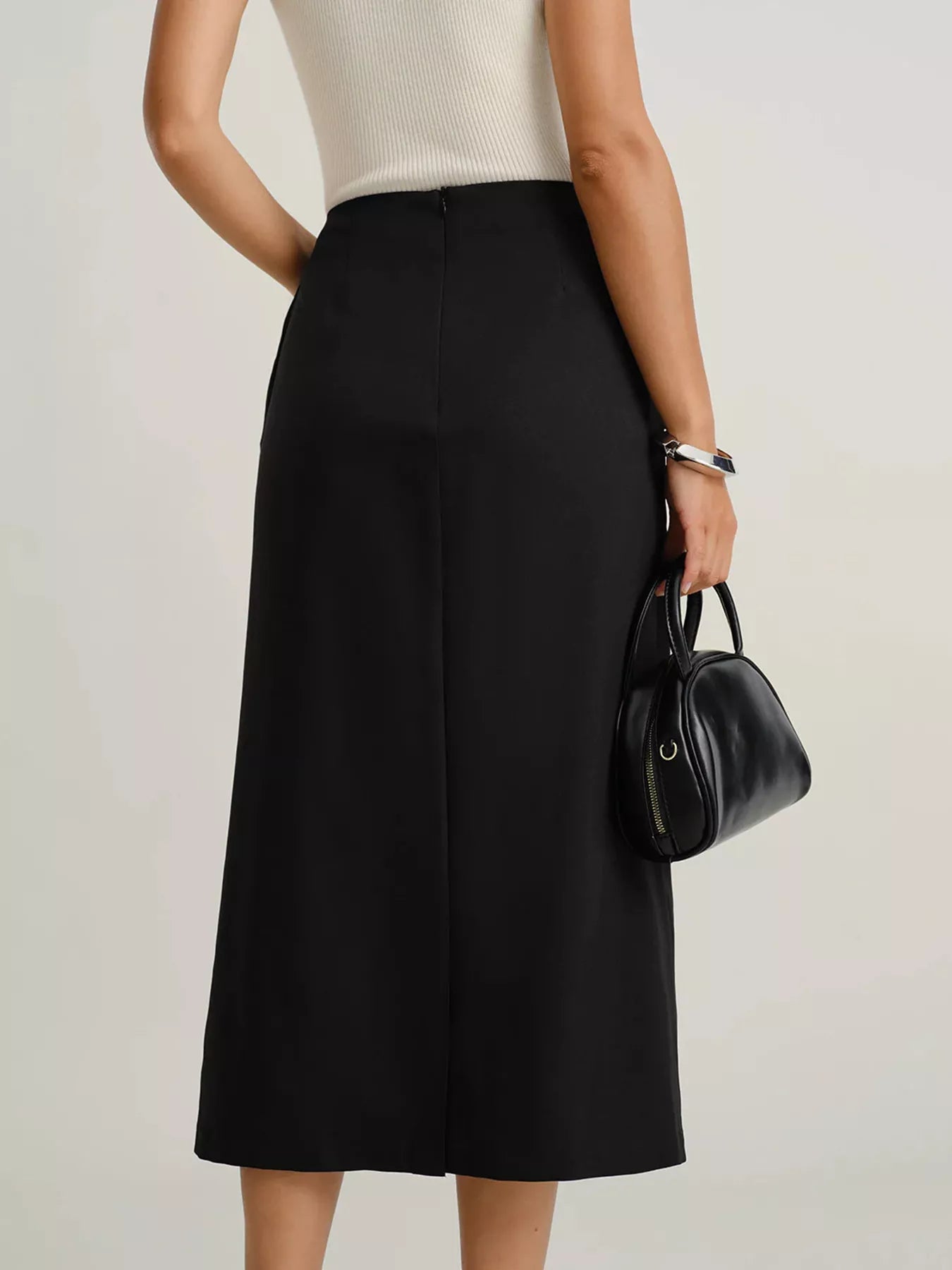 Elegant button-front midi skirt perfect for formal occasions and stylish office wear.