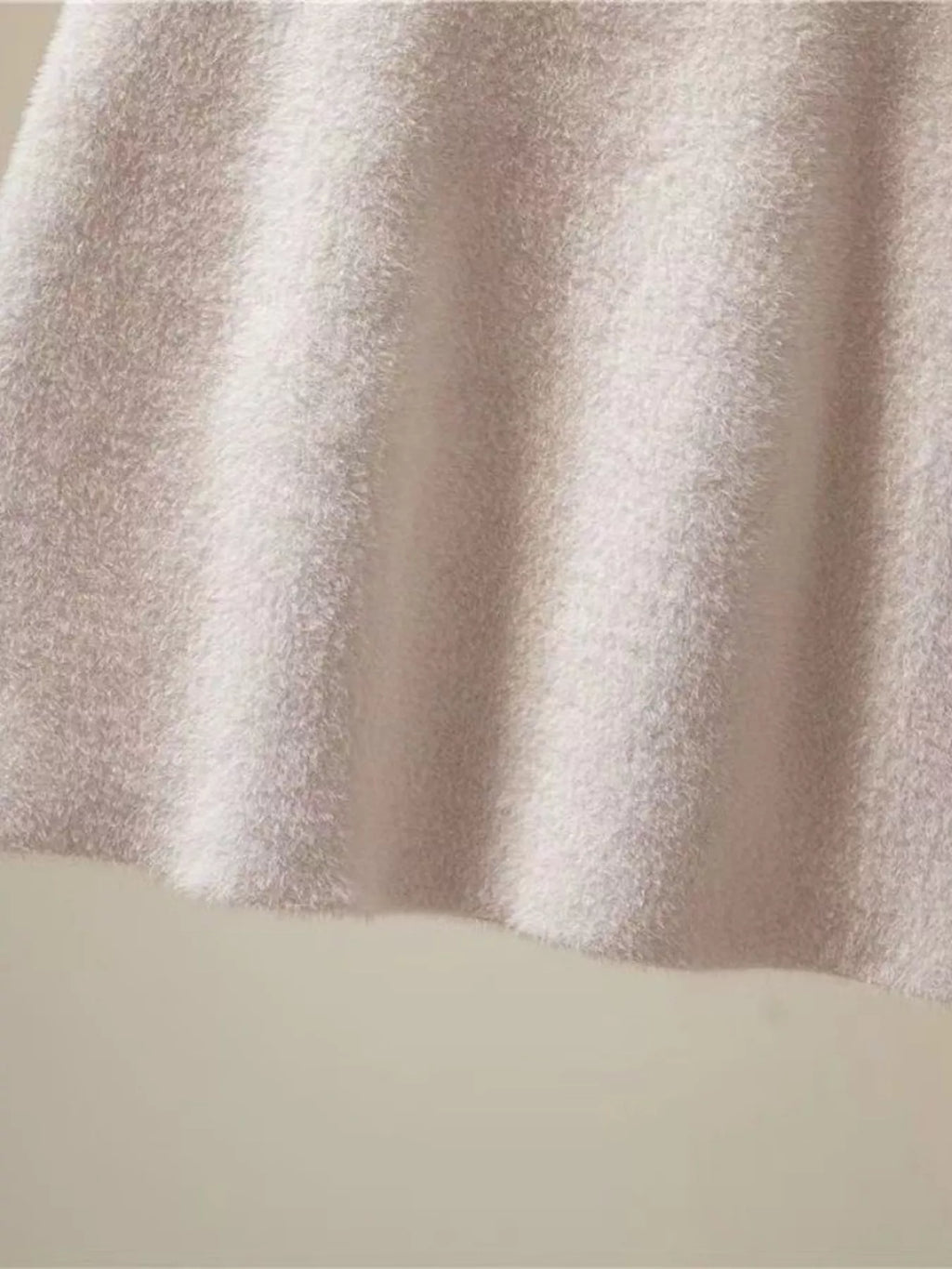 Elegant comfort plush mini skirt for stylish and cozy wear, perfect for versatile fashion.