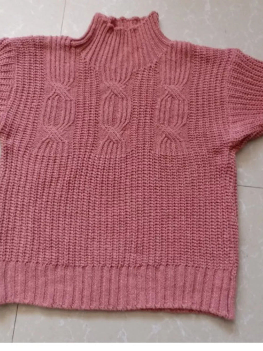 Stylish plus size turtleneck sweater offering warmth and comfort for elegant winter fashion