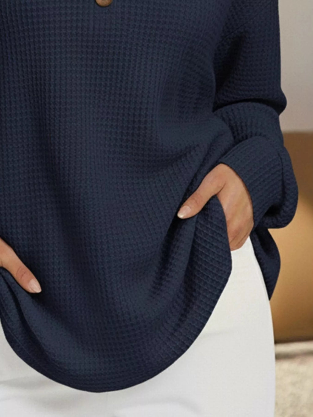 Plus size waffle knit sweater offering comfort and style for all body types, perfect for casual wear.