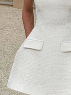 Cutout Back Round Neck Cap Sleeve Mini Dress.