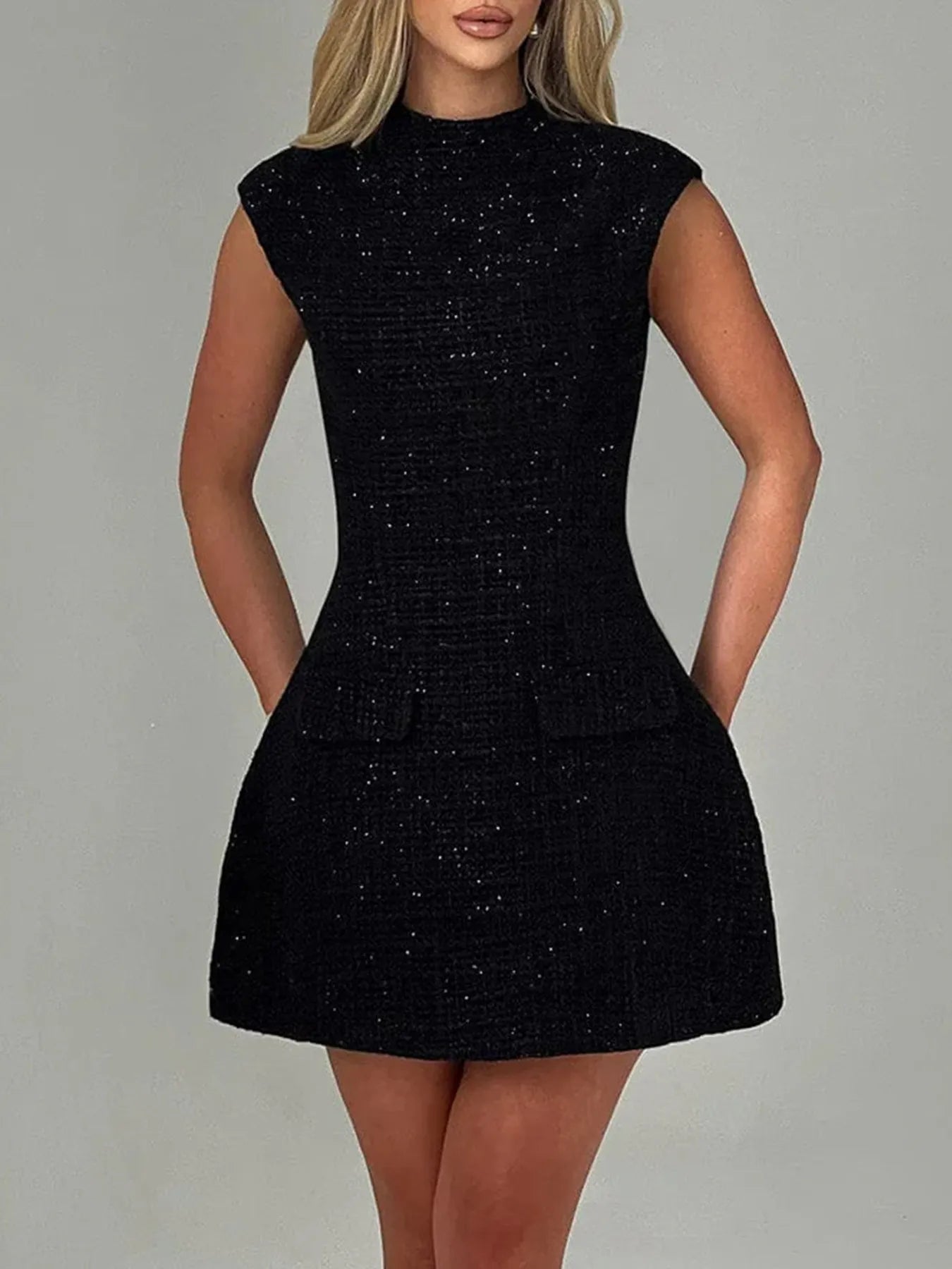 Cutout Back Round Neck Cap Sleeve Mini Dress.