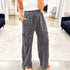 Medium grey high waist pants tailored for a refined and sophisticated look suitable for formal occasions.