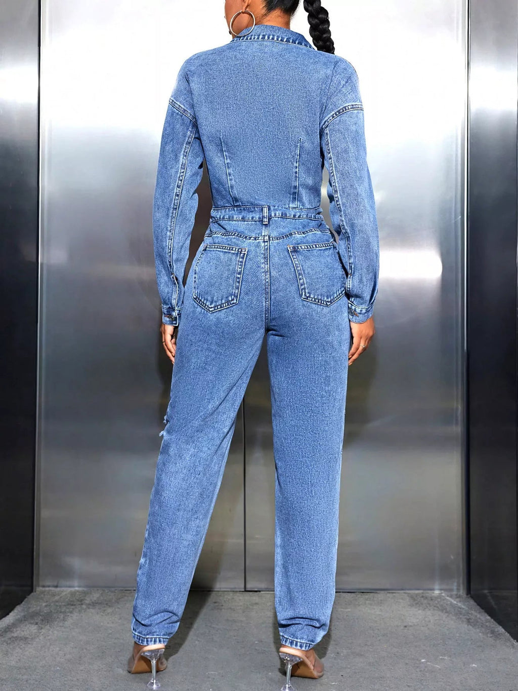 Distressed Long Sleeve Denim Jumpsuit.