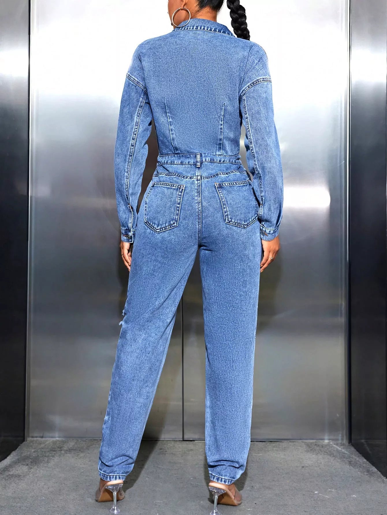 Distressed Long Sleeve Denim Jumpsuit.